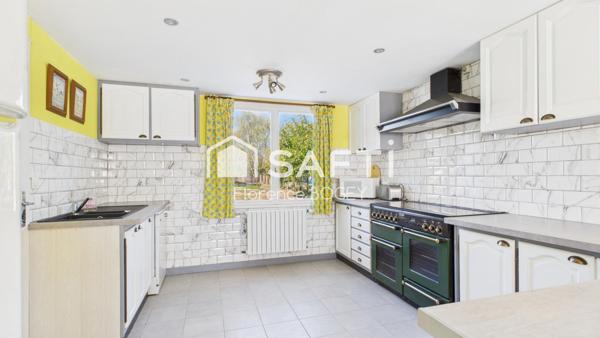 Maison familiale avec jardin et verger dans un quartier paisible