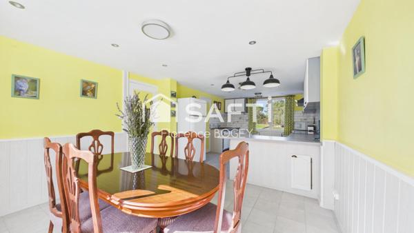 Maison familiale avec jardin et verger dans un quartier paisible