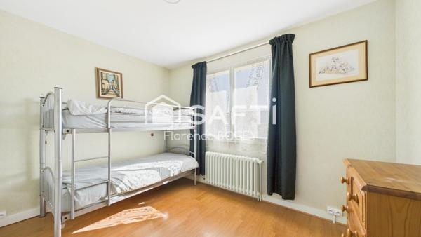 Maison familiale avec jardin et verger dans un quartier paisible