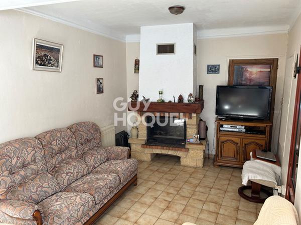 Maison d'habitation avec grenier aménageable + commerce en rez-de-chaussée avec accès indépendant, le tout sur une surface terrain de +/- 500 m² avec garages.