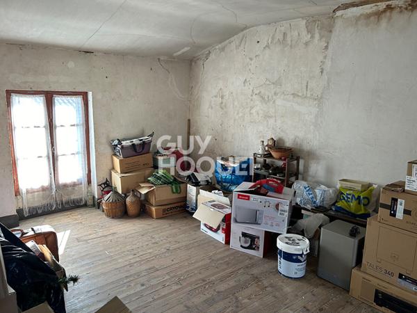 Maison d'habitation avec grenier aménageable + commerce en rez-de-chaussée avec accès indépendant, le tout sur une surface terrain de +/- 500 m² avec garages.