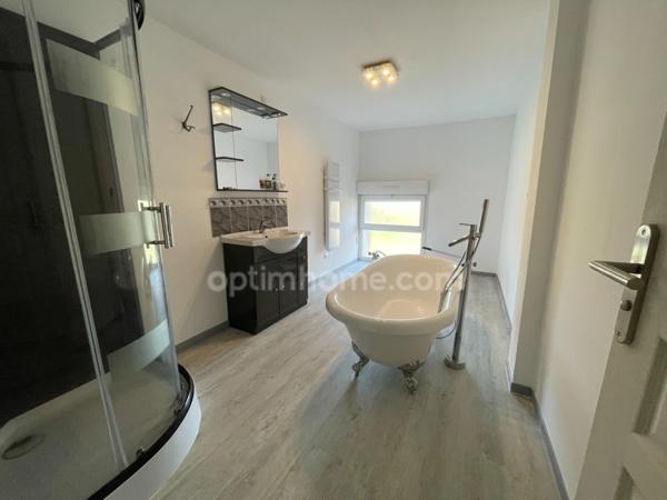 Maison individuelle avec 5 chambres et jardin