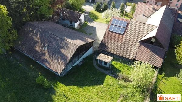 GROS POTENTIEL – MAISON + DÉPENDANCES – POSSIBILITÉ DE CRÉER PLUSIEURS LOGEMENTS – PROCHE SUISSE