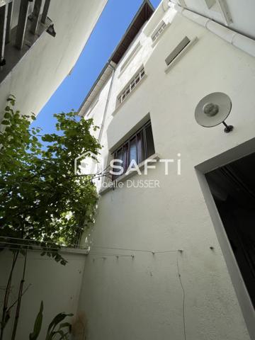 Une maison de ville début de siècle hyper contemporaine