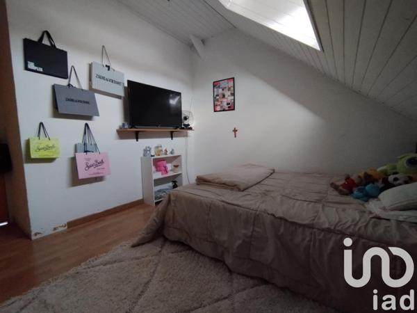 Maison 5 pièces de 112 m² à Cormontreuil (51350)