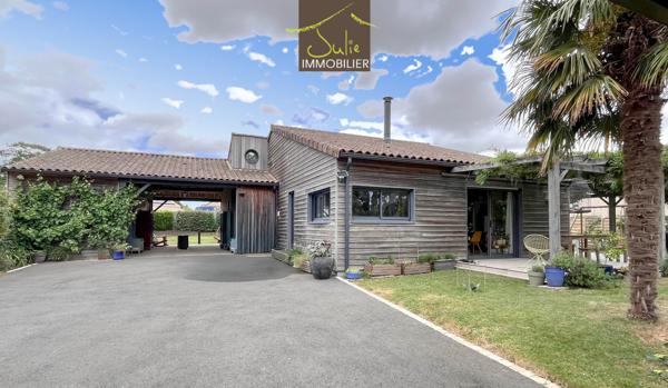 COUP DE COEUR ! Belle Propriété construction bois avec beaucoup de charme sur 1180m² de terrain.