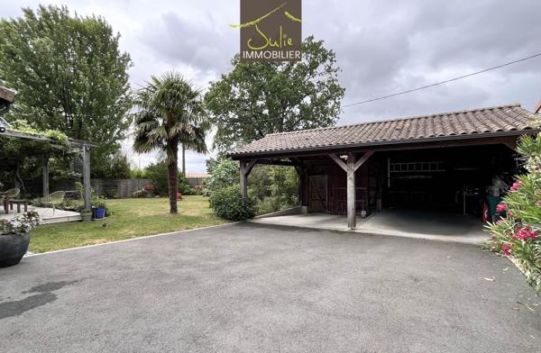 COUP DE COEUR ! Belle Propriété construction bois avec beaucoup de charme sur 1180m² de terrain.