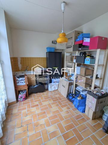 Maison à rénover avec garage, cave et dépendance