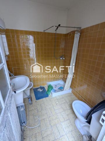 Maison à rénover avec garage, cave et dépendance