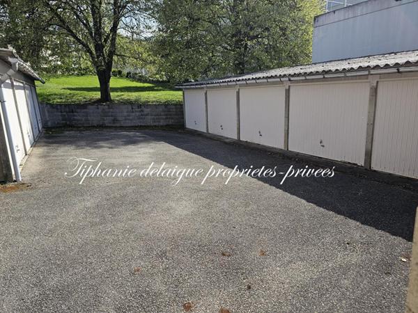 Le Chambon Feugerolles 42500 Ensemble Immobilier de 2 Maisons mitoyennes T3 et T4 avec 2 garages et un ensemble de 13 Garages sur 693m² de terrain