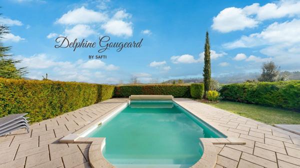 Belle maison de 170m2, piscine et vue dégagée, à deux pas des commerces.