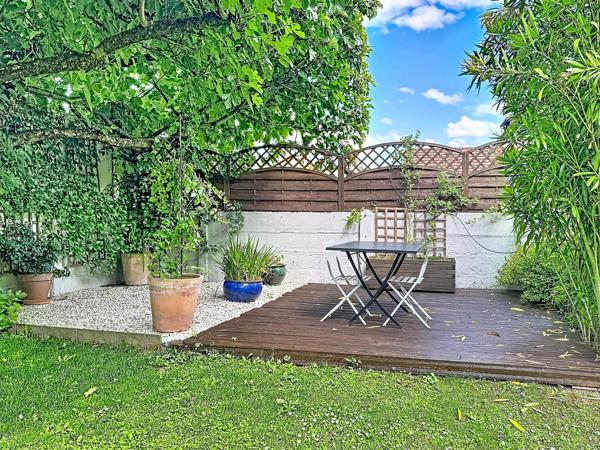 Appartement duplex avec jardin privatif
