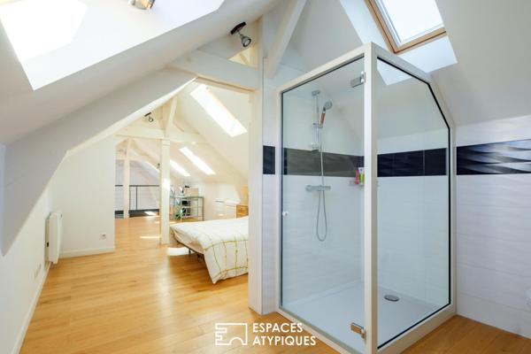 Loft d’architecte avec terrasse suspendue, ascenseur privatif et double garage – Poitiers Plateau