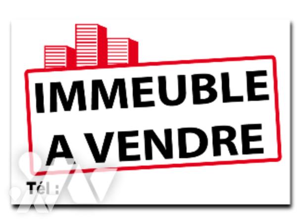 A VENDRE IMMEUBLE DE RAPPORT A BARENTIN LOCAL COMMERCIAL + DEUX APPARTEMENTS.
