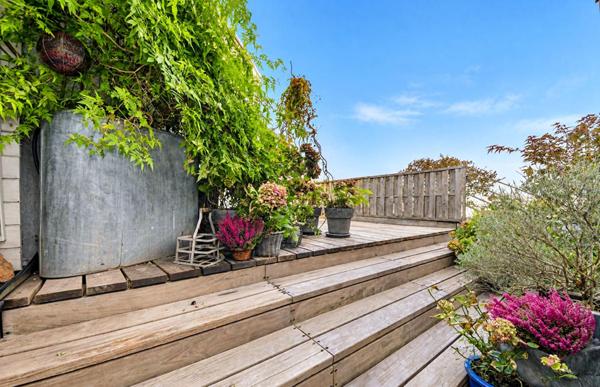 Duplex en dernier étage avec jardin paysager