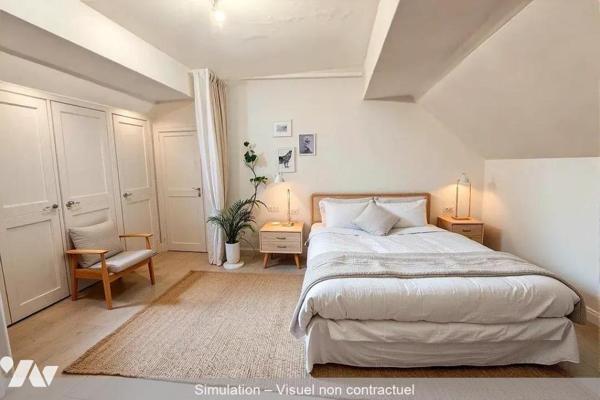 Immeuble à usage commercial ( avec exploitant ) et d'habitation en plein centre bourg du Lude
...