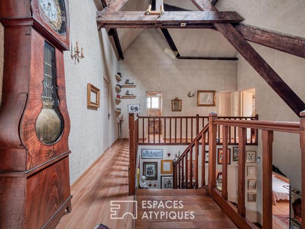 Maison années 70 avec une dépendance sur un parc arboré