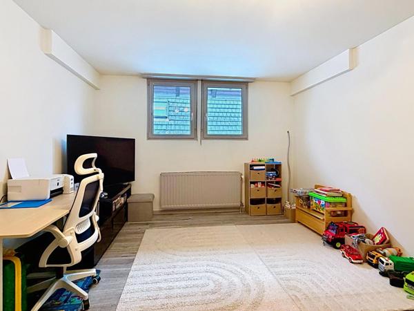 EN EXCLUSIVITE APPARTEMENT TRIPLEX  AVEC TERRASSE PARKING PRIVATIF ET UNE CAVE