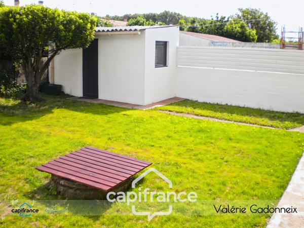 Maison individuelle avec jardin et garage proche centre-ville