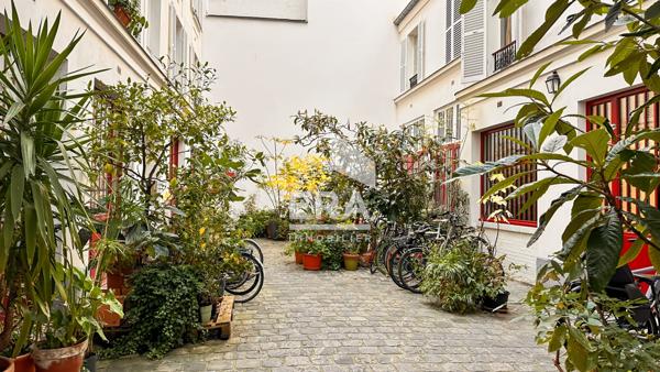 A VENDRE STUDIO 9,25M2 6E ASC. TRÈS BEL IMM. PIERRE DE TAILLE - GONCOURT CANAL ST MARTIN