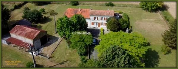 Grande maison divisée en 2 habitations