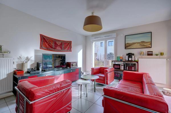 Appartement en rez de jardin, 4 chambres, terrain de 180m2 et grande terrasse à FRANCHEVILLE (69)