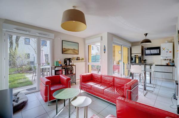 Appartement en rez de jardin, 4 chambres, terrain de 180m2 et grande terrasse à FRANCHEVILLE (69)