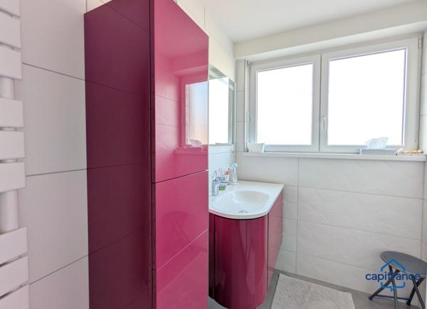 Appartement à vendre 4 pièces SAINT LOUIS (68) Appartement traversant de 94 m2 avec cave et balcon