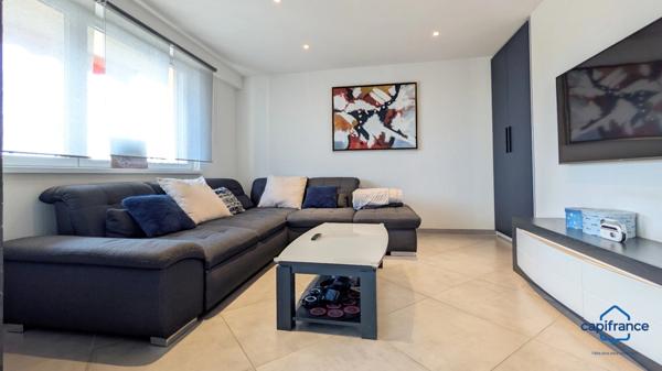 Appartement à vendre 4 pièces SAINT LOUIS (68) Appartement traversant de 94 m2 avec cave et balcon