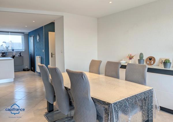 Appartement à vendre 4 pièces SAINT LOUIS (68) Appartement traversant de 94 m2 avec cave et balcon