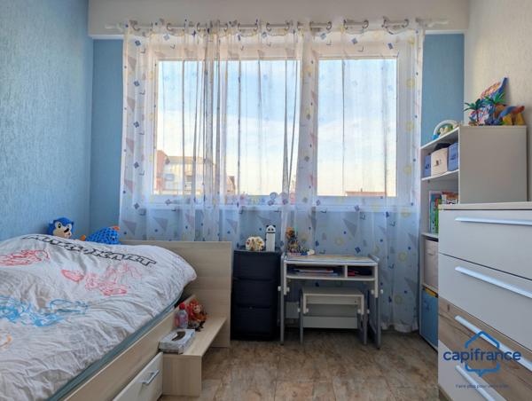 Appartement à vendre 4 pièces SAINT LOUIS (68) Appartement traversant de 94 m2 avec cave et balcon