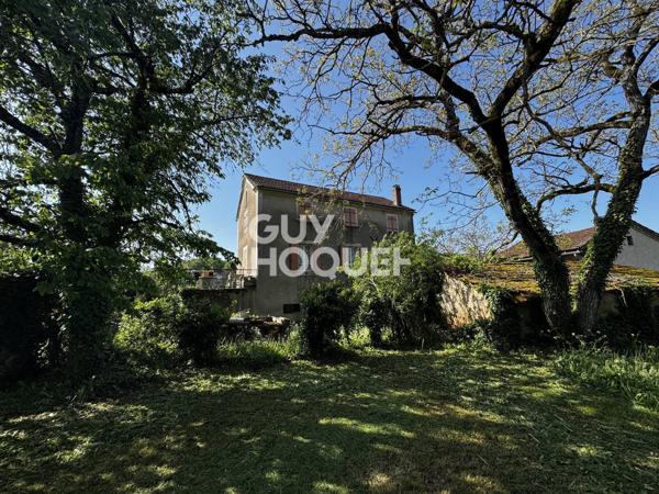 Maison familiale avec jardin et dépendances