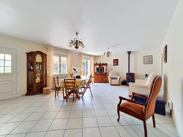 Située à 1,5 kms du centre de Beuzeville, dans une petite impasse, je vous invite à découvrir cette adorable maison traditionnelle, viable de plain-pied, construite sur vide sanitaire dans les années 2000. Au rez-de-chaussée, vous découvrirez un joli séjour/salon (avec poêle à granulés), donnant sur une véranda très lumineuse et offrant un espace de vie supplémentaire, une cuisine Schmidt (aménagée et équipée) ouverte sur le séjour, trois chambres (dont une avec placard et dressing), une salle d'eau et un wc. Vous trouverez également un vaste cellier, où se trouve l'escalier qui permet l'accès à l'étage de la maison, étage à finir d'aménager et composé d'un palier et de deux chambres. A l'extérieur, vous pourrez bénéficier d'un abri de jardin en bois avec porte motorisé, et d'un abri de jardin en métal. Le tout sur une parcelle de terrain clos d'environ 700 m².
Quelques informations sur ses prestations: Menuiseries en double vitrage, volets roulants, portail motorisé, assainissement par tout-à-l'égout.
Contactez moi pour toutes questions, et pour une éventuelle visite si ce bien répond à vos attentes !
