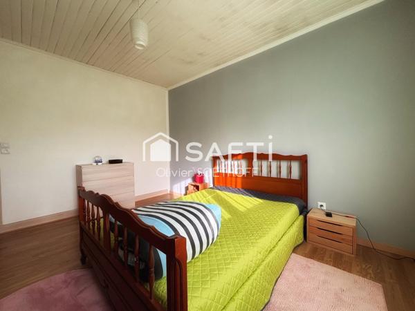 Volumes généreux, terrain arboré de 1 500 m² et projet locatif envisageable