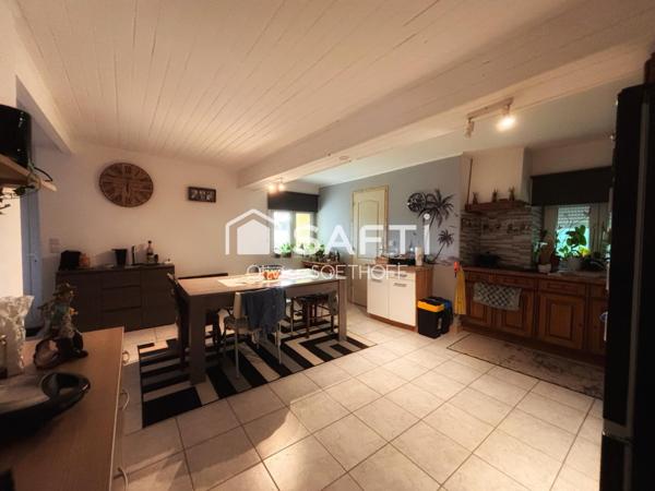 Volumes généreux, terrain arboré de 1 500 m² et projet locatif envisageable