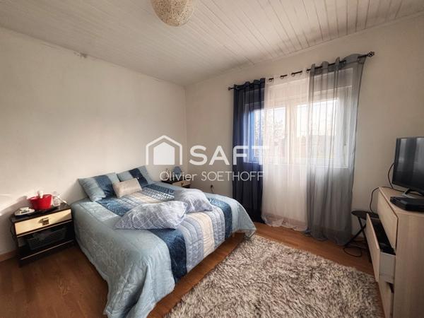 Volumes généreux, terrain arboré de 1 500 m² et projet locatif envisageable