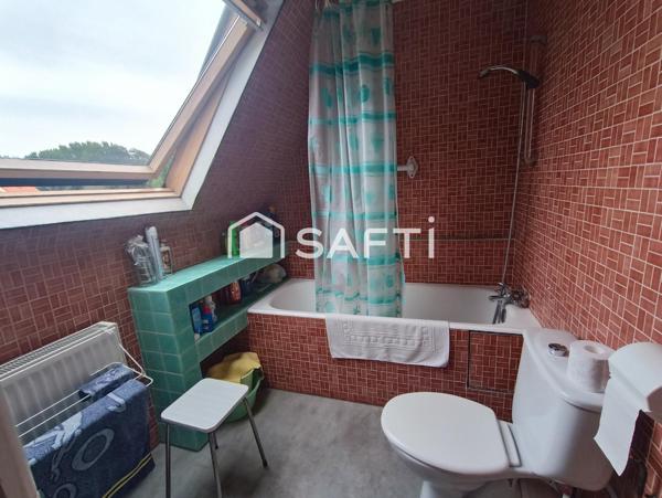 Maison 3 chambres jardin garage à raffraichir