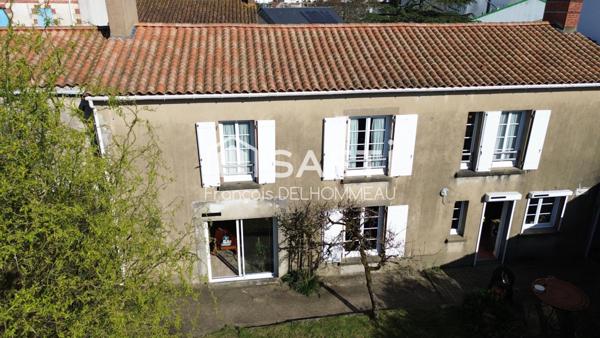Maison de caractère 130m2, 4 chambres, garage et jardin