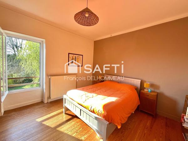 Maison de caractère 130m2, 4 chambres, garage et jardin