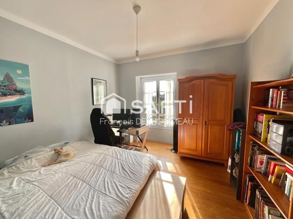 Maison de caractère 130m2, 4 chambres, garage et jardin