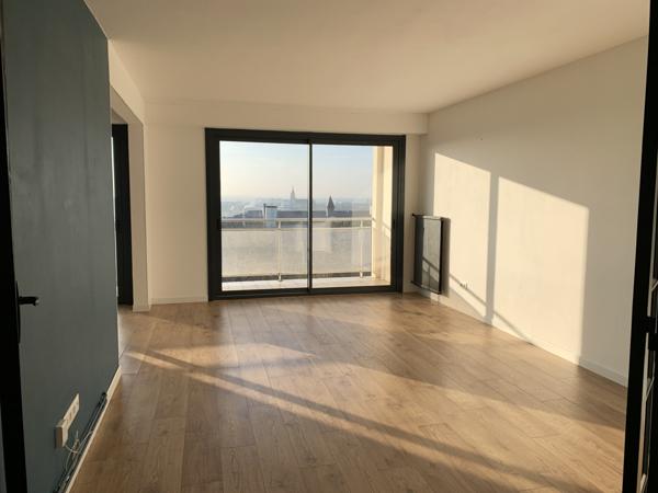 Appartement T3 avec balcon, cave et garage