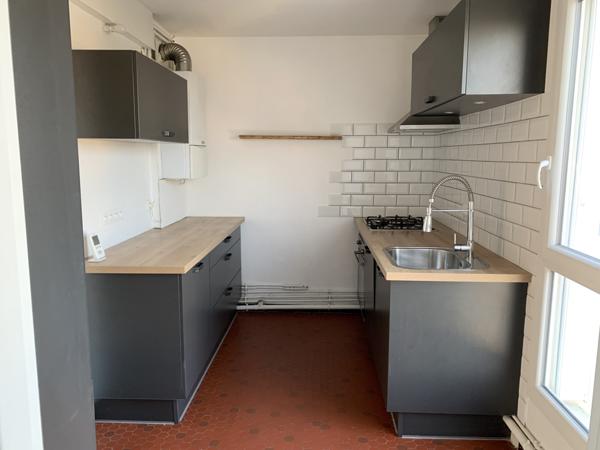 Appartement T3 avec balcon, cave et garage