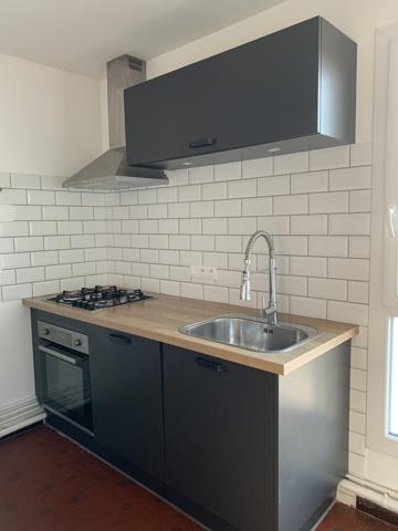 Appartement T3 avec balcon, cave et garage