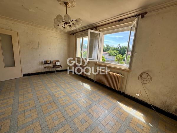 Maison 4 pièces avec sous-sol complet et garage attenant