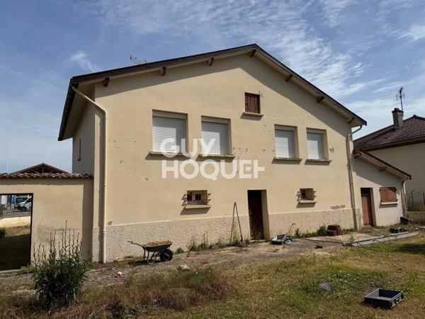 Maison 4 pièces avec sous-sol complet et garage attenant