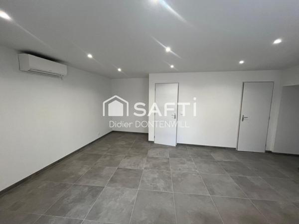 T2 au rez de chaussée dans un immeuble en pierres entièrement rénové 38460