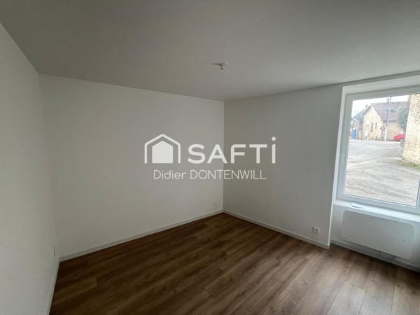 T2 au rez de chaussée dans un immeuble en pierres entièrement rénové 38460