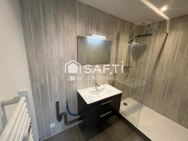 T2 au rez de chaussée dans un immeuble en pierres entièrement rénové 38460