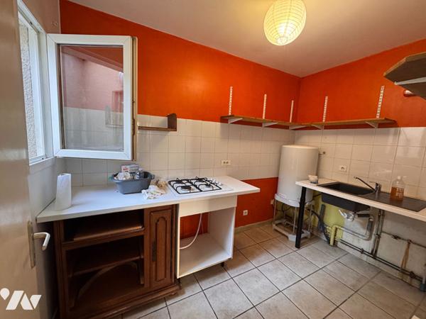 Appartement T2 proche du centre ville avec place de parking