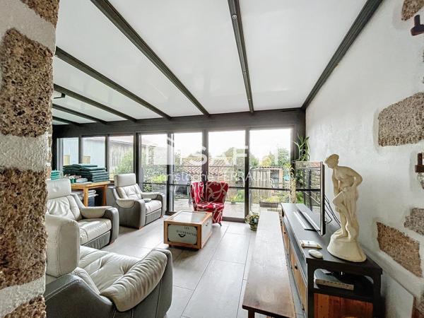 Propriété à la maison rénovée avec fort potentiel